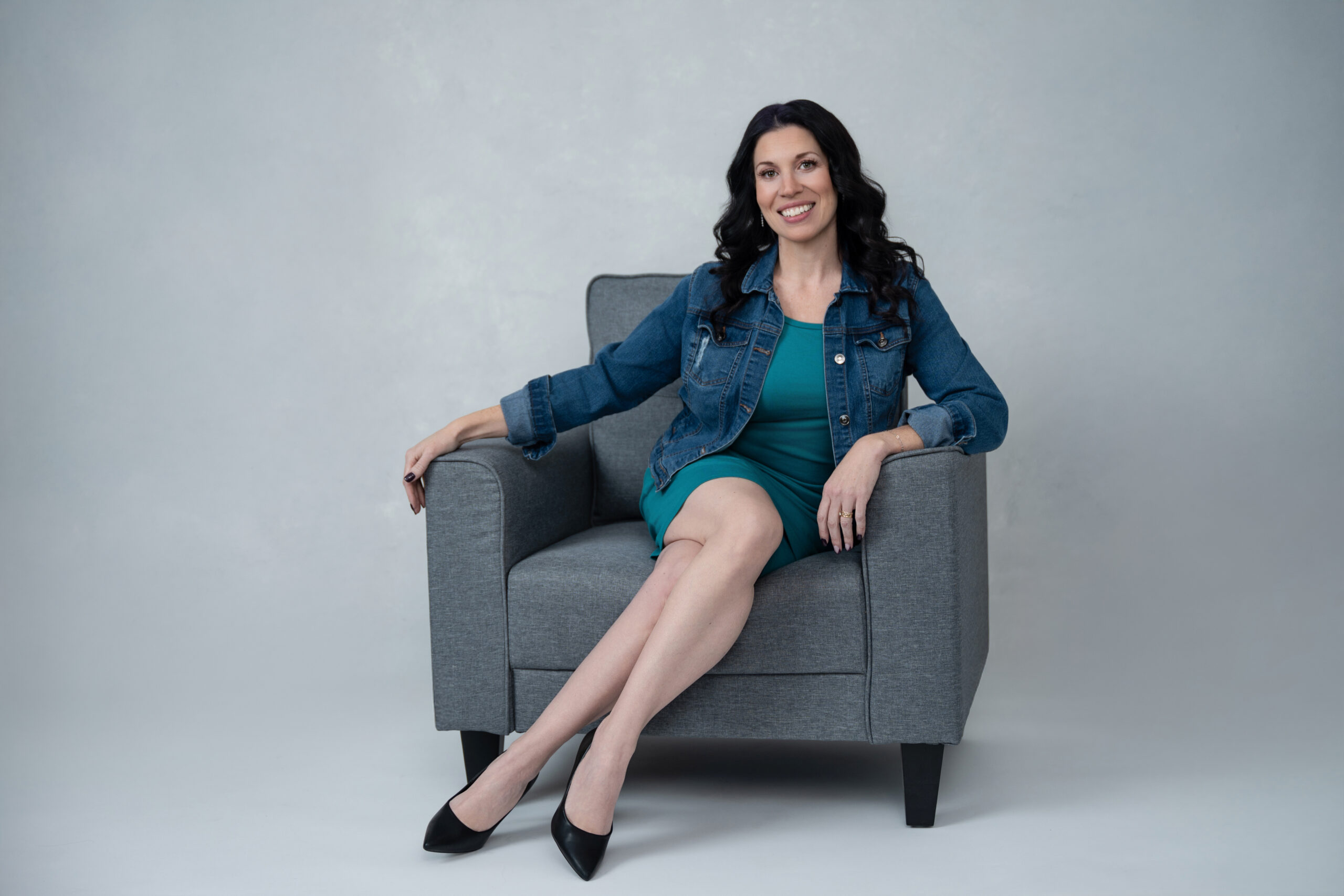 Katrina Houghton sitting on a chair